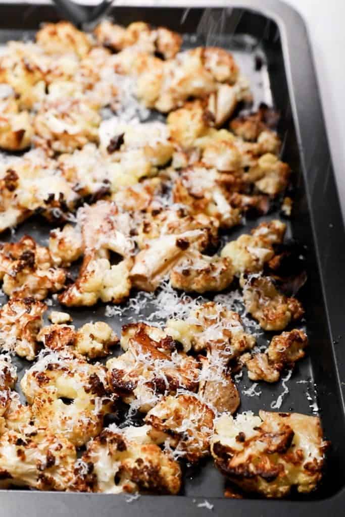 roasted cauliflower with parmesan sprinkled over it