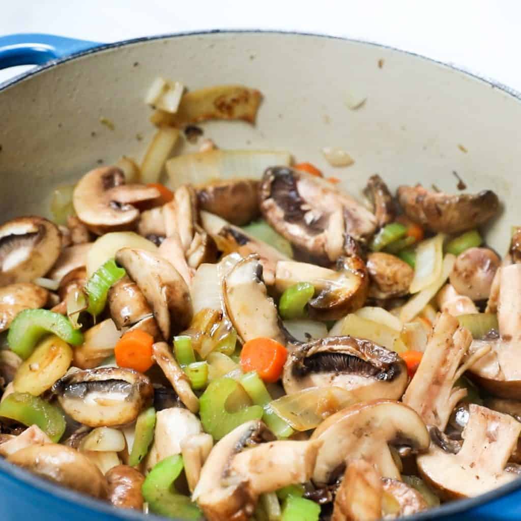 mushrooms added to the pan with the onion mixture