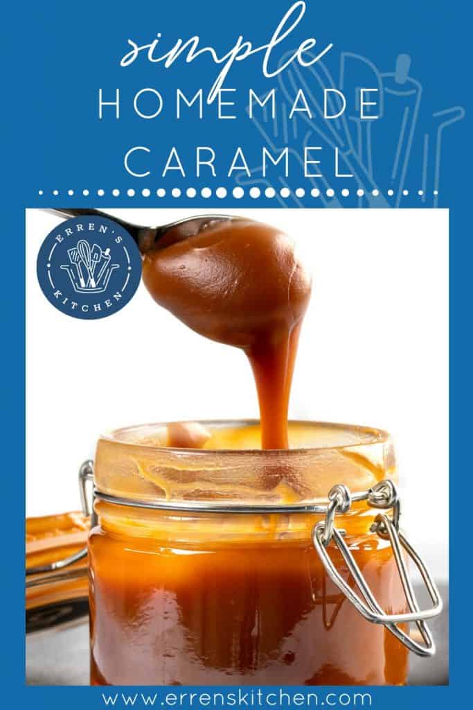 Spoon with tasty caramel sauce over jar on table.