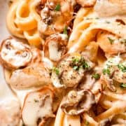 picture of chicken and mushroom alfredo on a plate