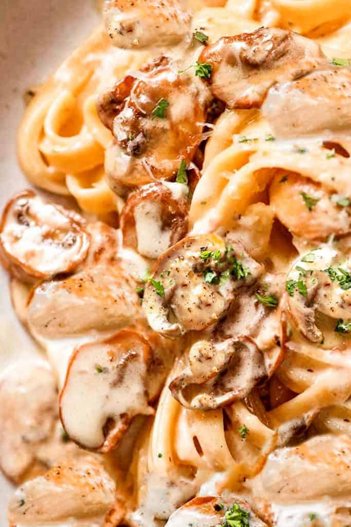 picture of chicken and mushroom alfredo on a plate