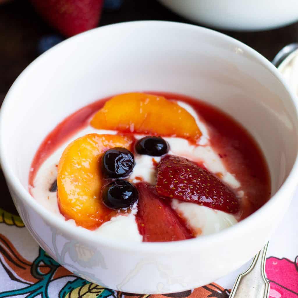 fruit compote with cream in a bowl
