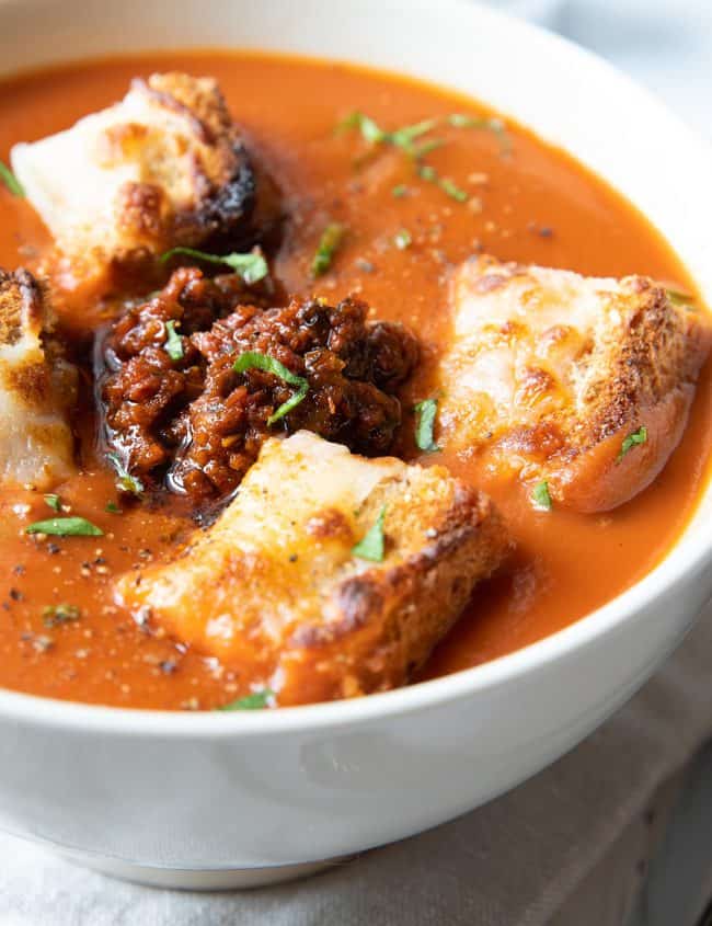 Tomato Pesto Soup topped with cheesy croutons