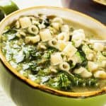 a bowl of escarole soup with pasta