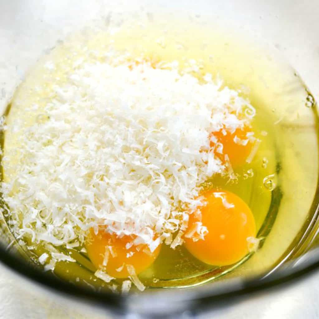 cheese and eggs in a bowl