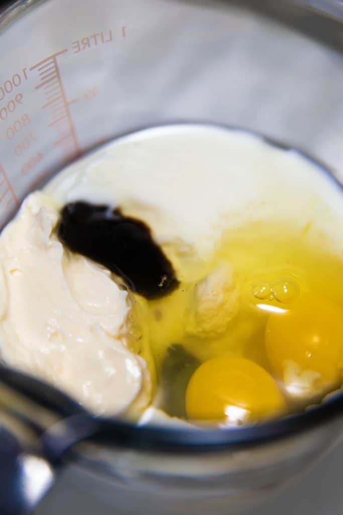 eggs added to dry mix in a jug