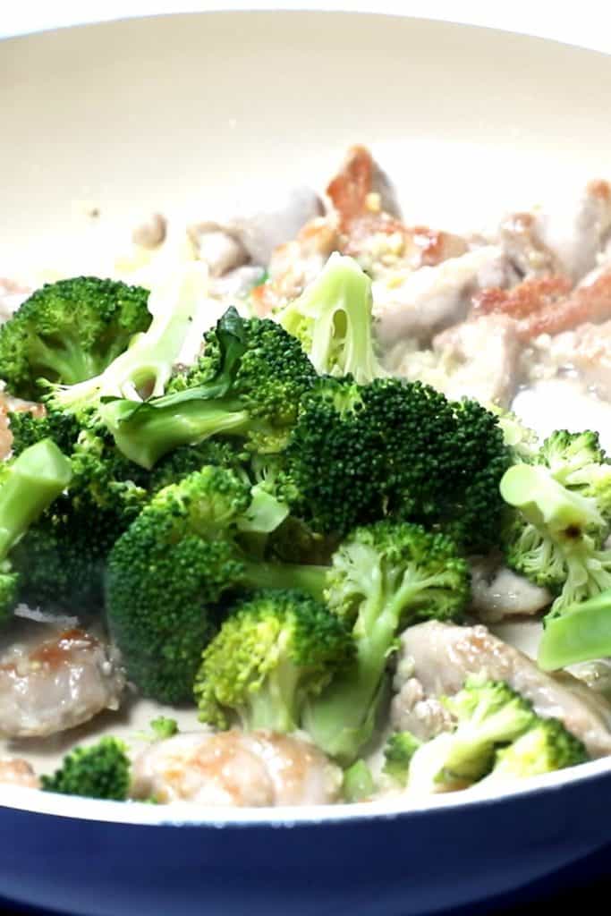 broccoli and chicken in a pan