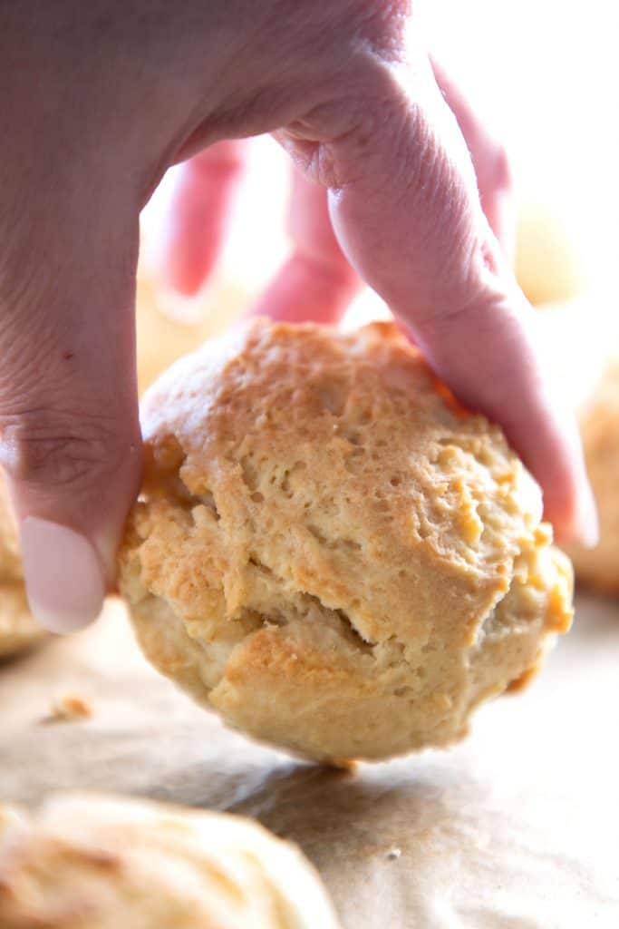a drop biscuit being held up to show 