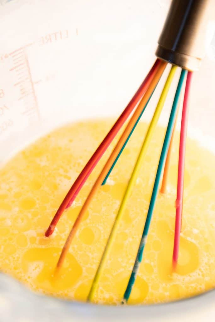 melted butter being mixed with a whisk