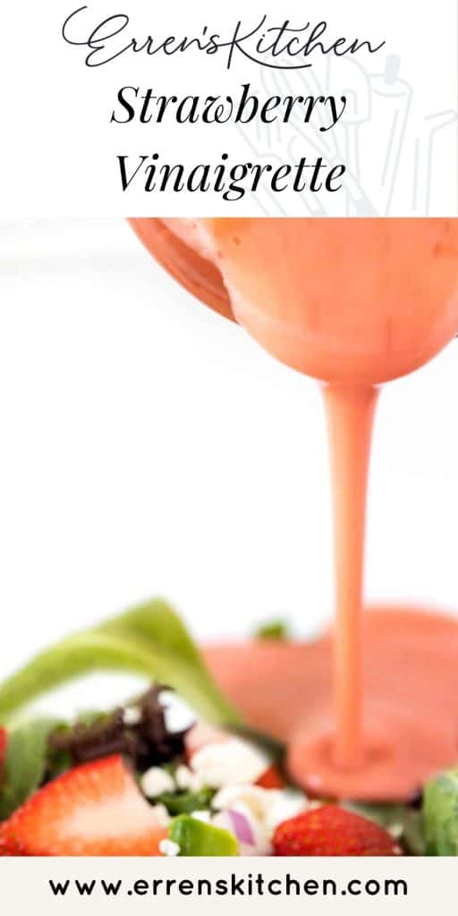 strawberry salad dressing being poured onto a salad