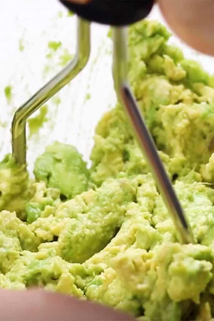 avocados being mashed