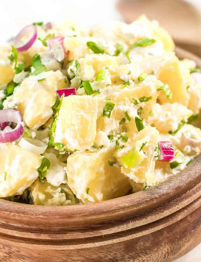 Potato salad with mayonnaise and red onion,