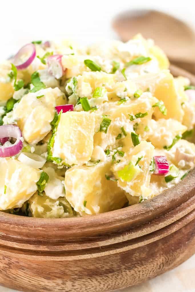 Potato salad with mayonnaise and red onion,