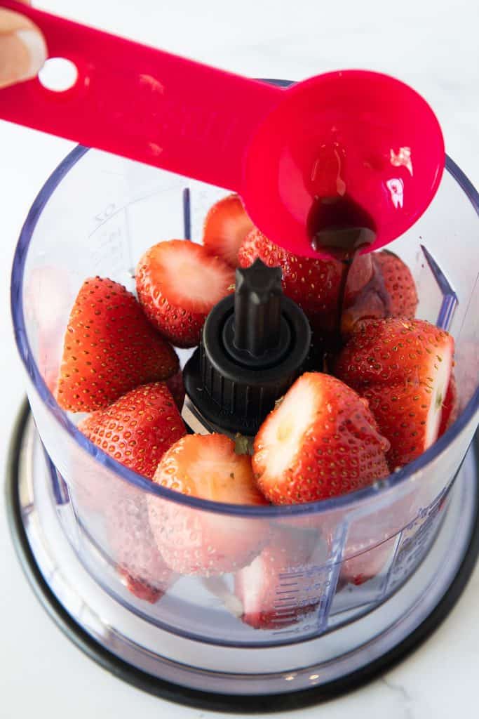 balsamic vinegar added to strawberries and honey