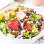 a bowl of fresh strawberry salad