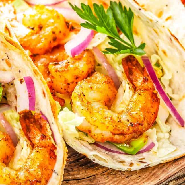 Shrimp Tacos on wooden cutting board
