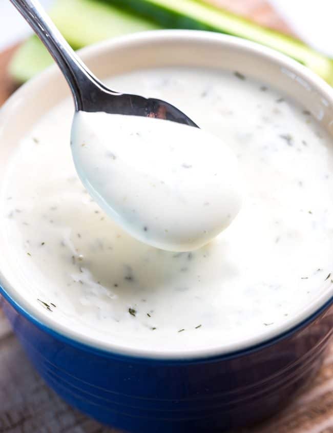 a closeup image of a spoonful of ranch dressing