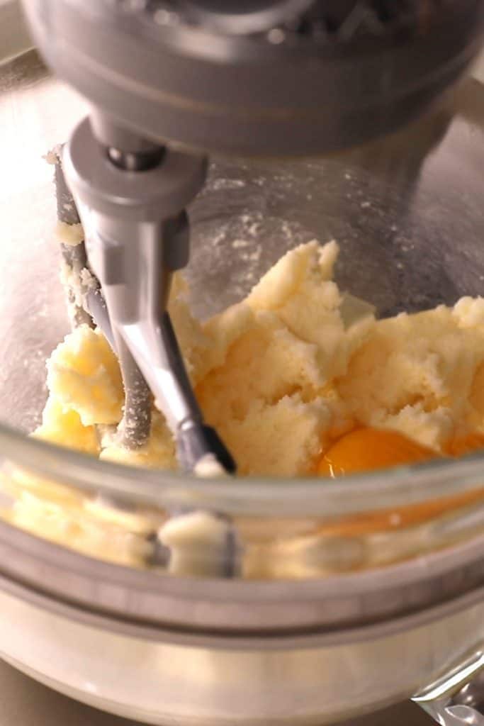 creamed butter in a bowl with egg