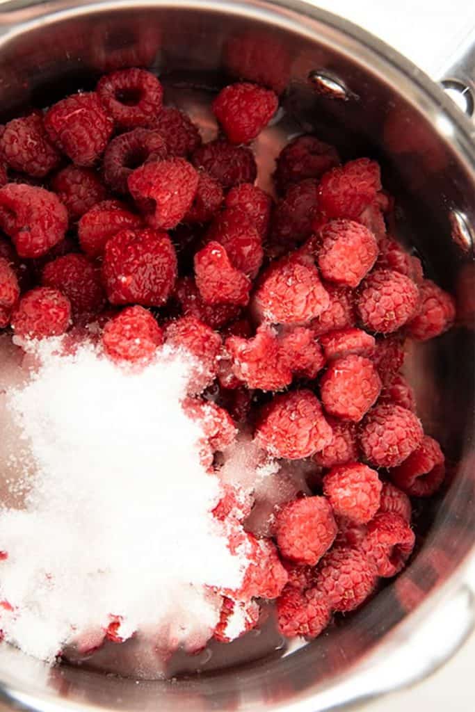 raspberries and sugar in a pot