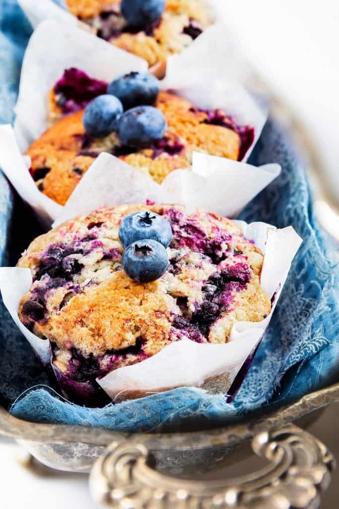 blueberry muffins on a silver serving dish