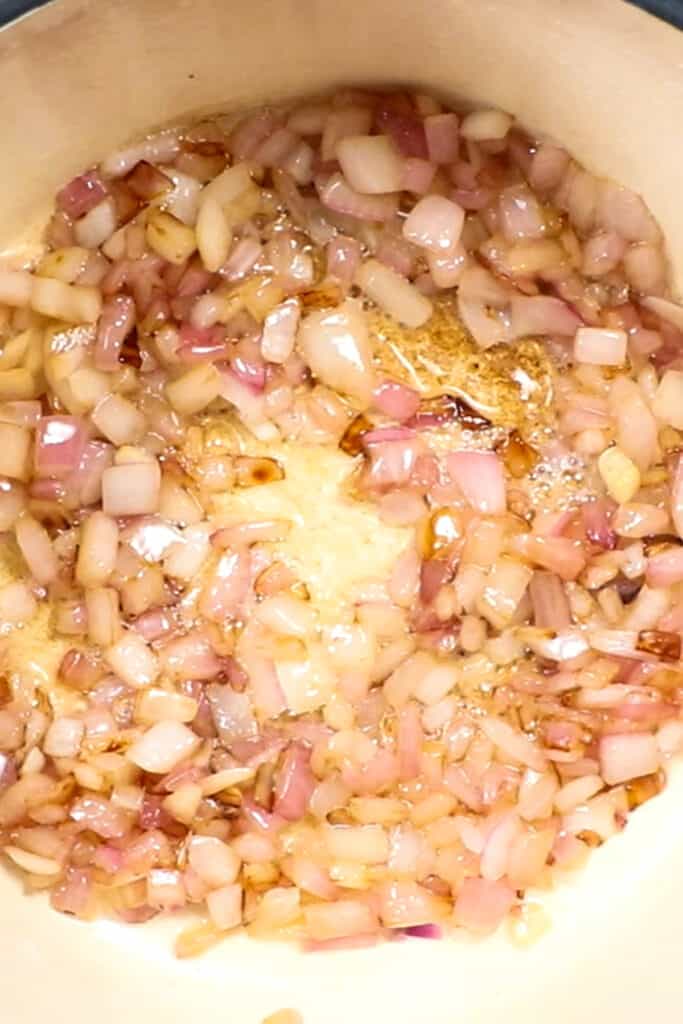 onions cooking in a pot