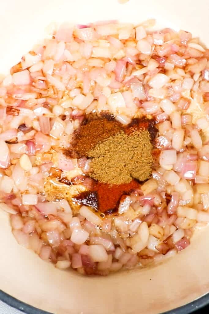 Onions with spices in a pot