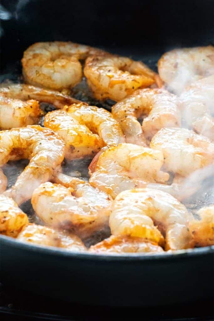 shrimp cooking in a pan