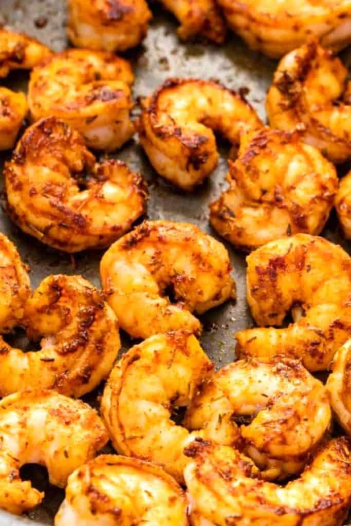 cooked, golden shrimp in a pan