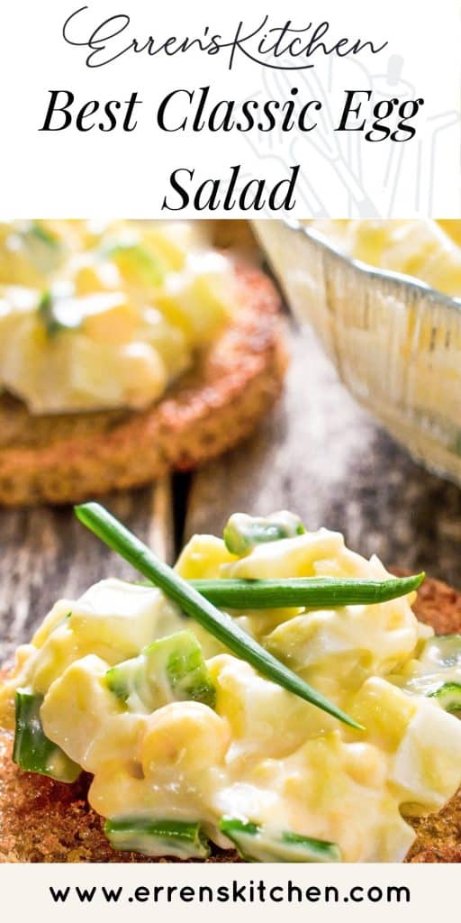 Egg salad with chives on a wooden background. Selective focus.