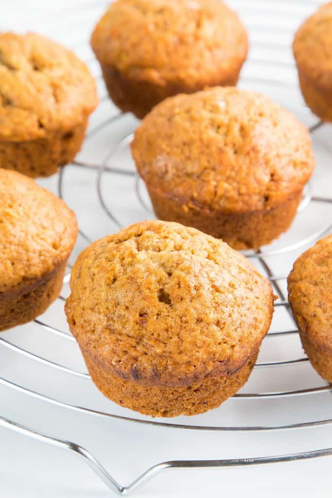 banana bread muffins cooling on a rack