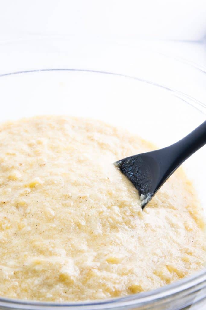 the wet ingredients added to the banana mixture