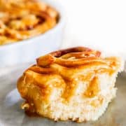 Closeup shot of the piece of freshly baked delicious Cinnamon Roll