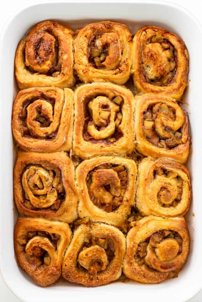 Freshly baked Cinnamon Rolls With Apple Pie Filling in the pan.