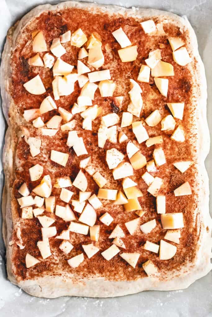the chopped apples added to the dough with the butter, cinnamon, and sugar.