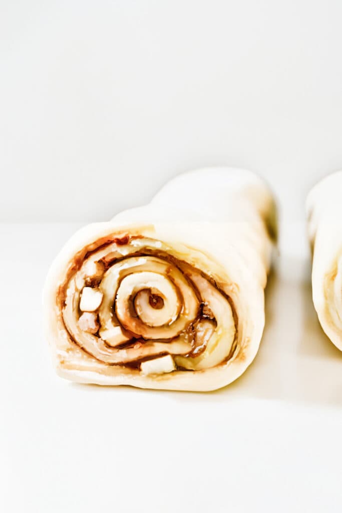 the rolled dough for Cinnamon Rolls With Apple Pie Filling.