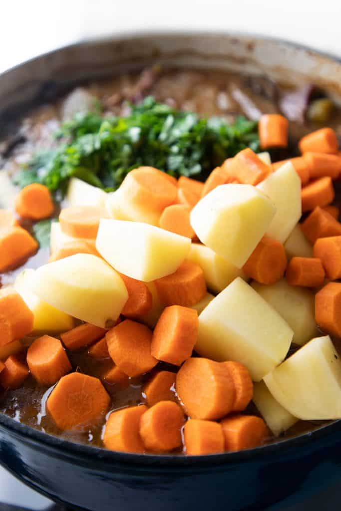 the carrots and potatoes added to the stew mixture