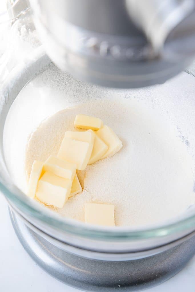 butter in the dry ingredients ready to be beaten