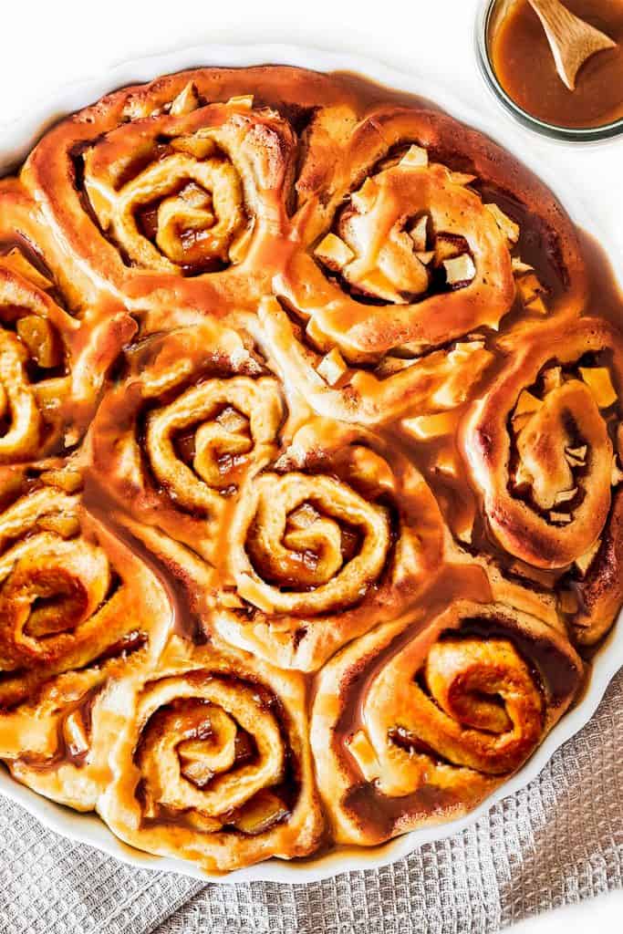 A top view of the freshly baked delicious Cinnamon Rolls with Apple Pie Filling on a plate
