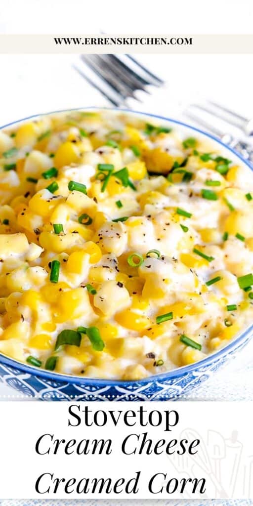 creamed orn in a bowl scattered with chopped chives