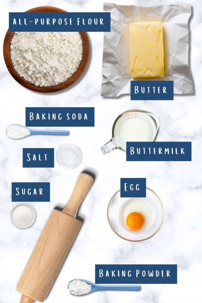 all of the ingredients for Homemade Buttermilk Biscuits laid out on a table