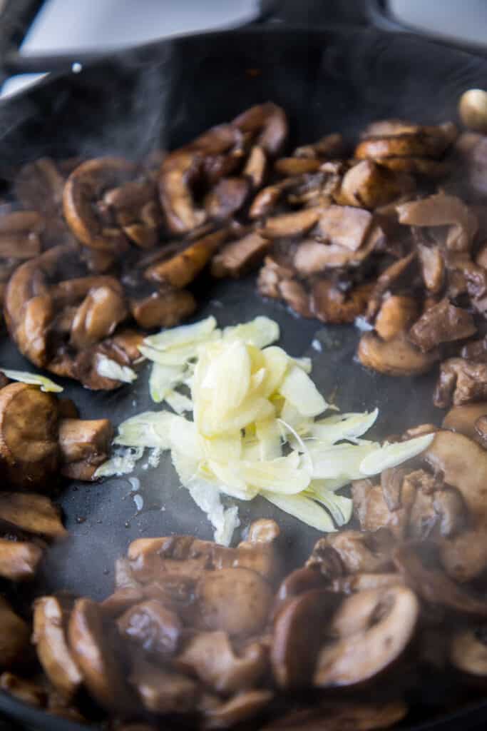 mushrooms with sliced garlic