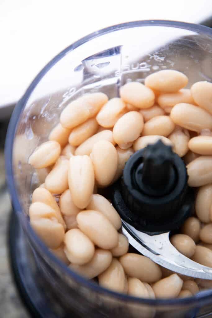 beans in the bowl of a food processor