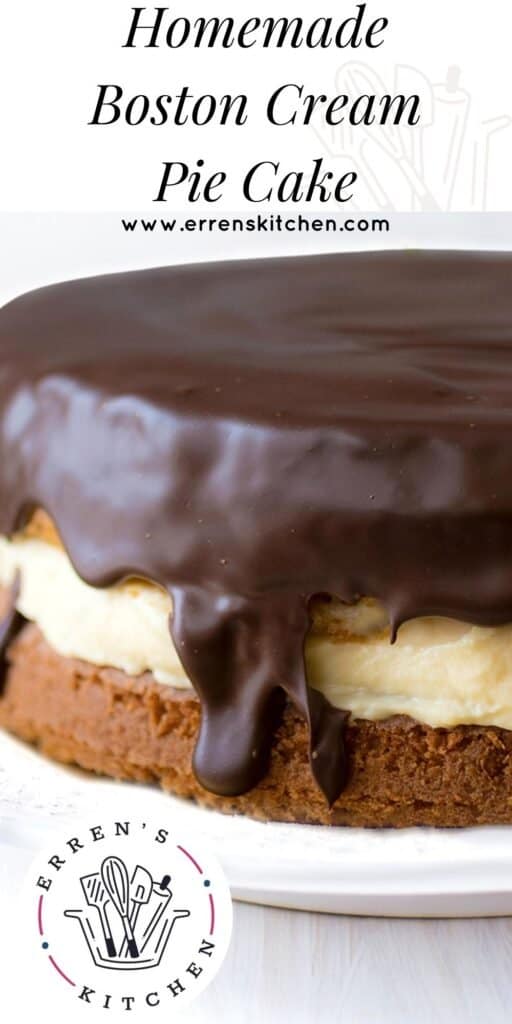 a close up of a vanilla cake filled with custard and covered in chocolate glaze