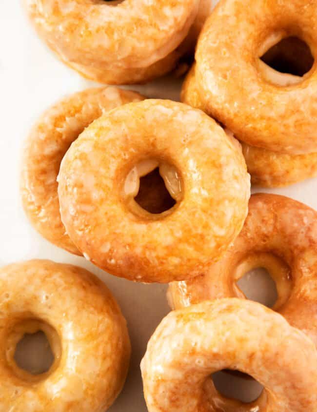 glazed cake donuts in a pile