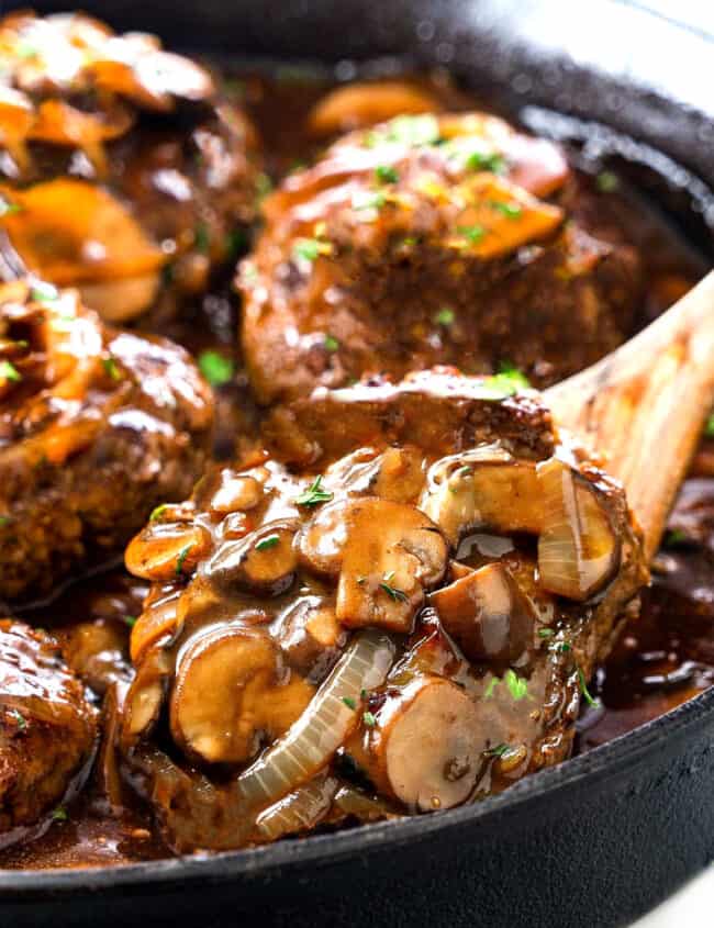 salisbury steak in a pan ready to be served