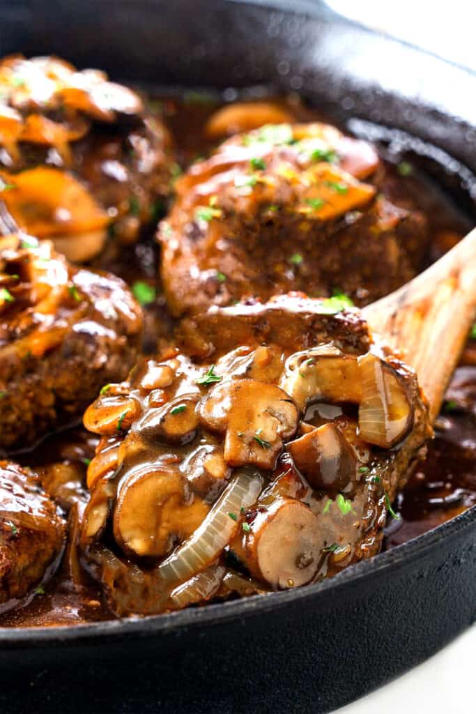 salisbury steak in a pan ready to be served