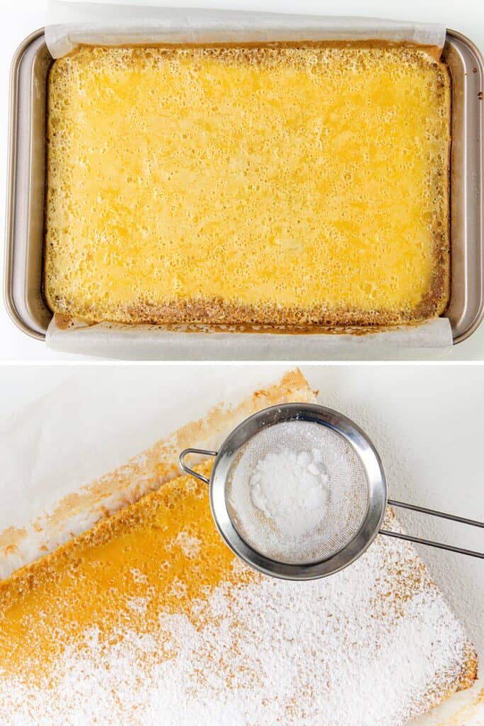 A rectangular lemon bar dessert, made from the Best Lemon Squares Recipe, sits in a baking pan and is then partially lifted onto parchment paper, being dusted with powdered sugar using a fine mesh sieve.