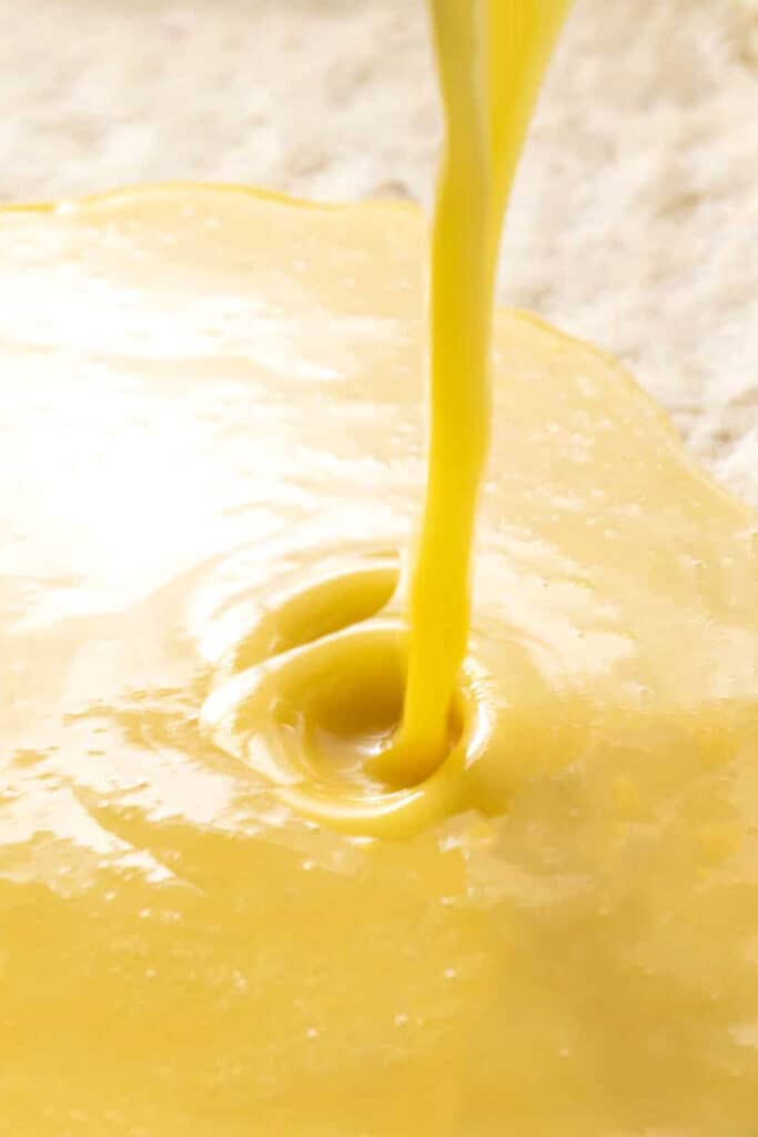 batter being poured into a pan