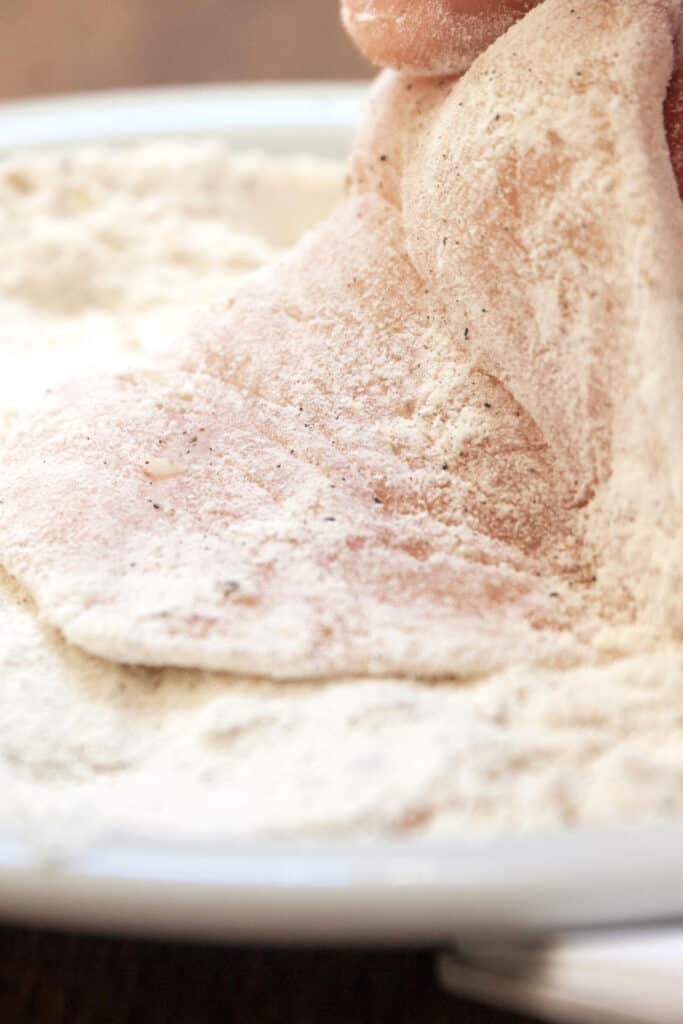 chicken breast coated with flour