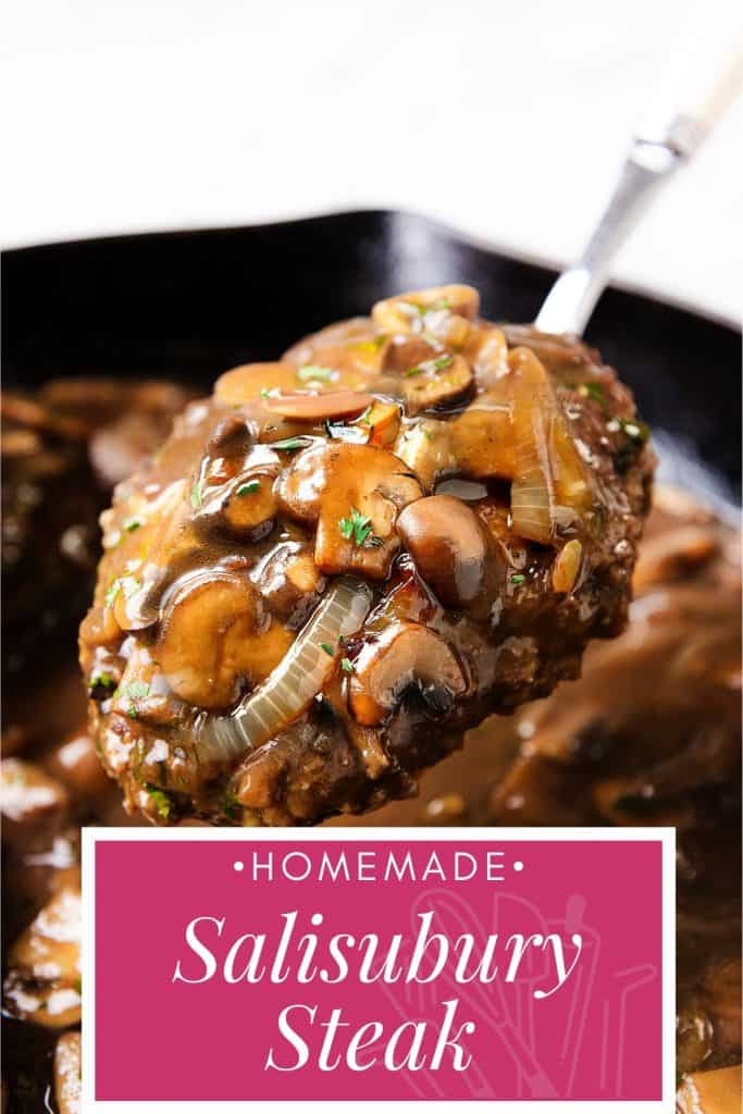 A spoon lifts a juicy Salisbury Steak topped with mushroom and onion gravy from a pan. Text at the bottom reads "Homemade Salisbury Steak" in white on a pink background.